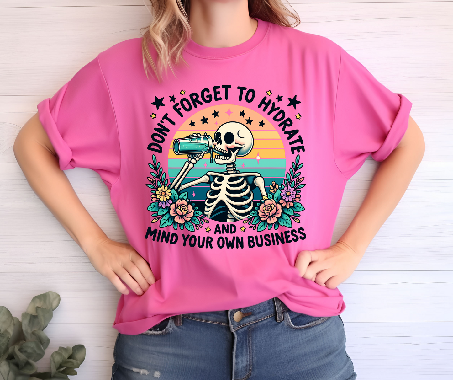 Graphic T-Shirt With Skeleton Drinking And The Text Don't Forget To Hydrate And Mind Your Own Business
