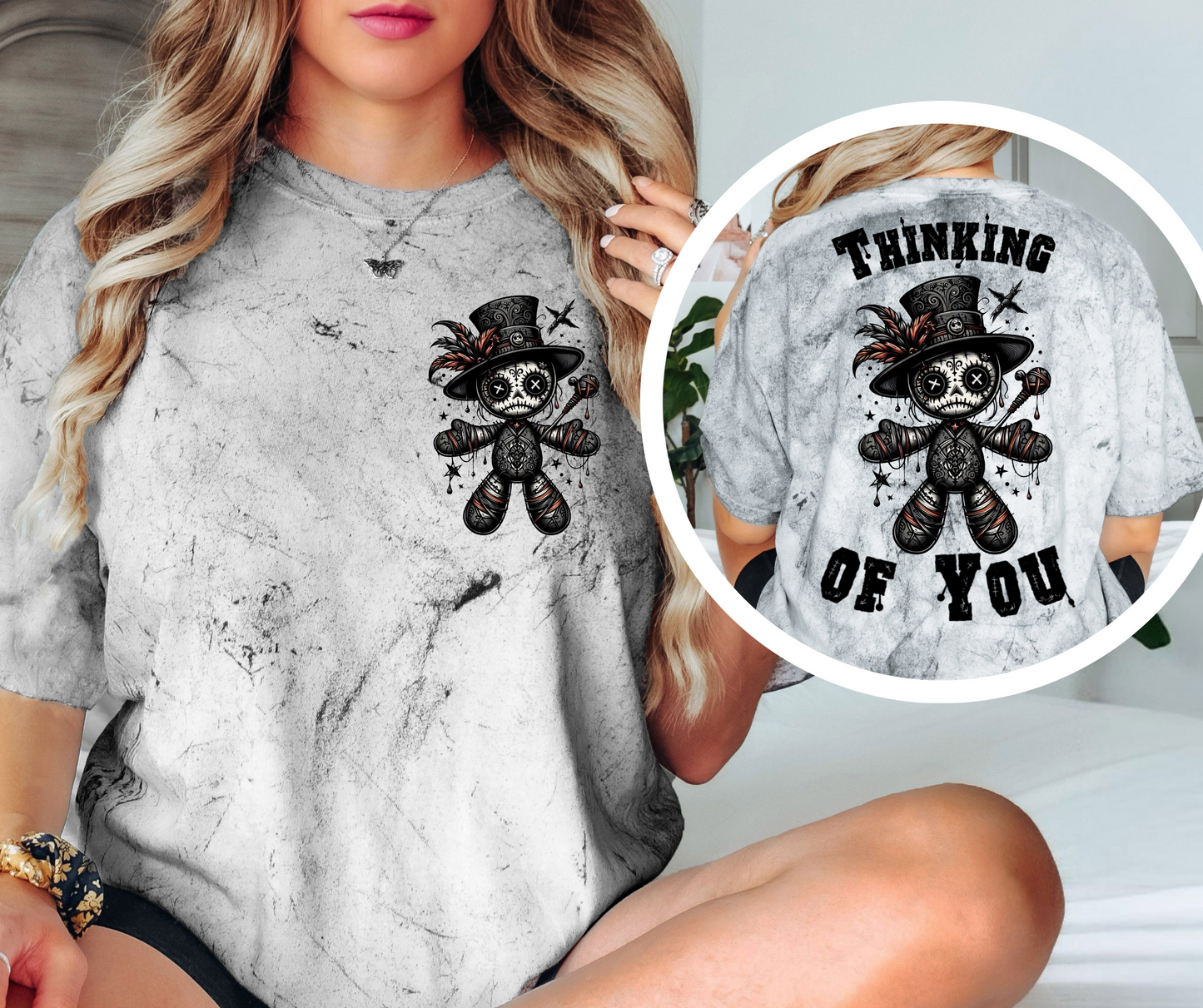 A Smoke Tie-Dye shirt with a graphic design of a Voodoo Doll with 'Thinking of You' text.