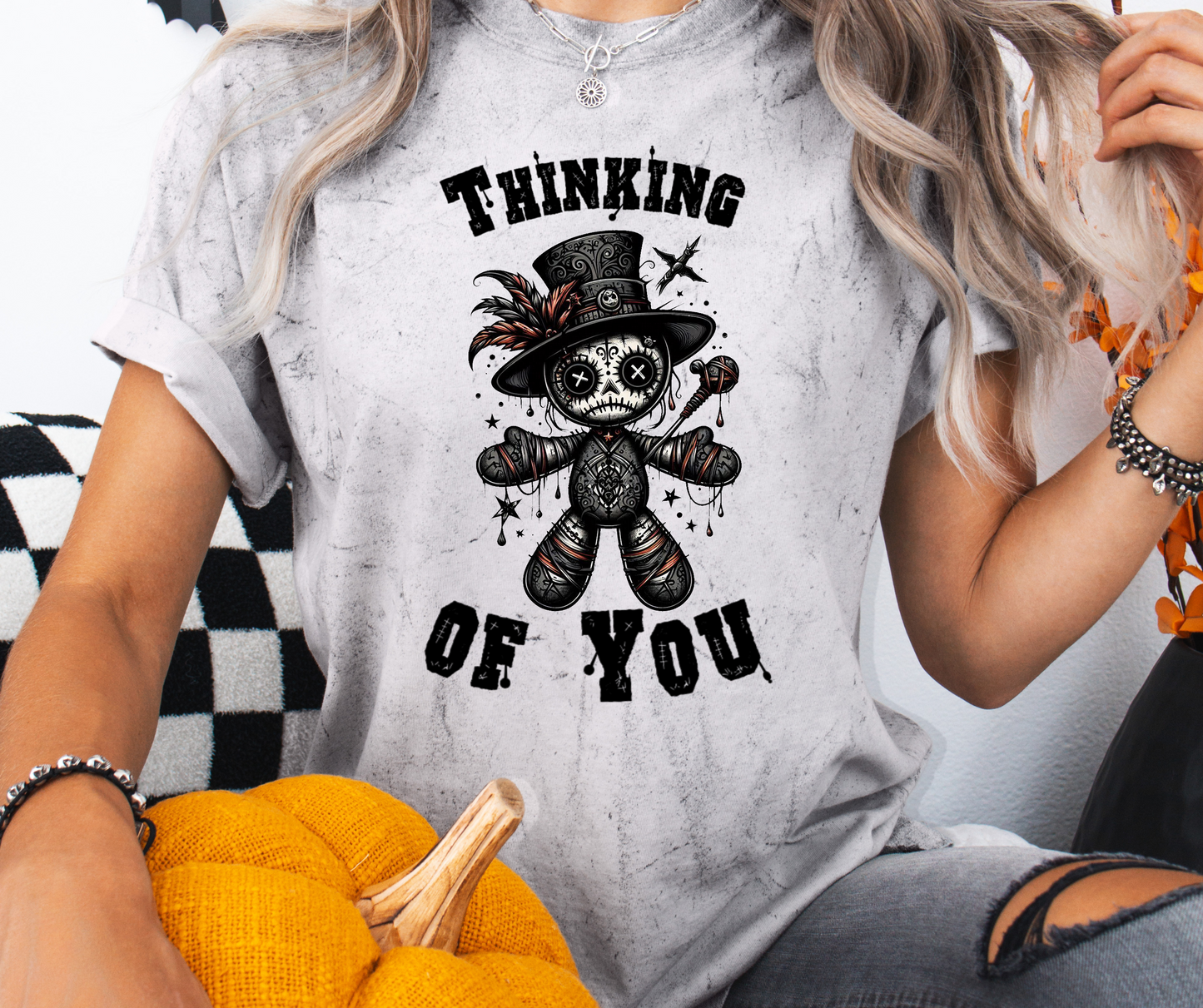 Smoke tie-dye shirt with a graphic design of a Voodoo Doll with 'Thinking of You' text.