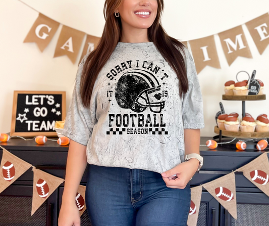 Graphic T-Shirt with a Football Helmet and the distressed text Sorry I Can't It Is Football Season