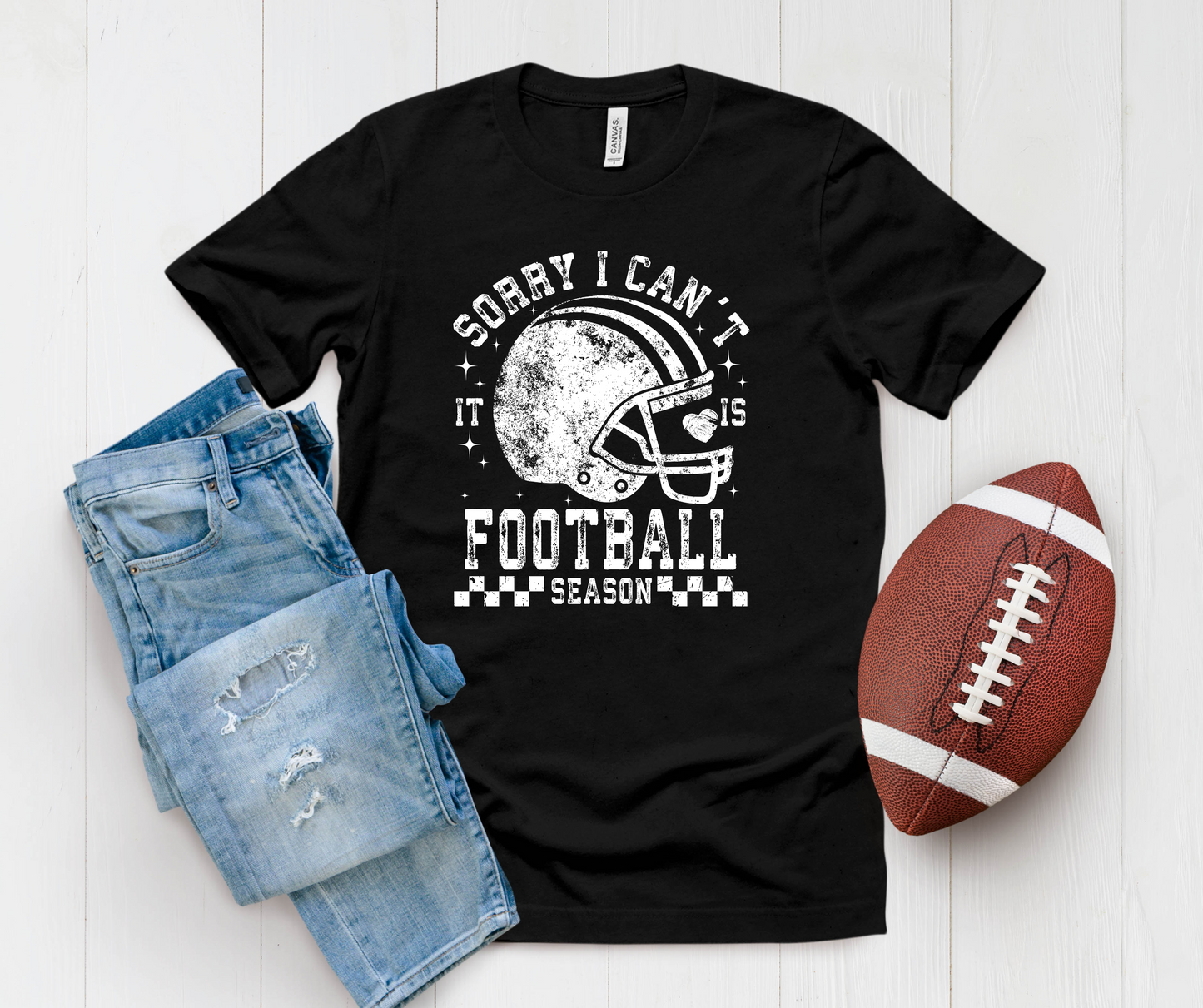 Graphic T-Shirt with a Football Helmet and the  text Sorry I Can't It Is Football Season