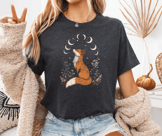 Graphic T-Shirt With A Fox Sitting Looking Up At Several Moons