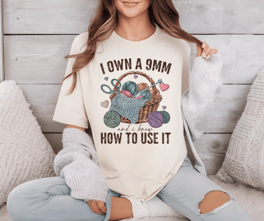 Graphic T-Shirt With Text I Own a 9mm & Know How to Use It 