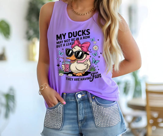  tank top with a duck graphic and  the text My Ducks May Not Be In A Row But A Least  They Are Having Fun.